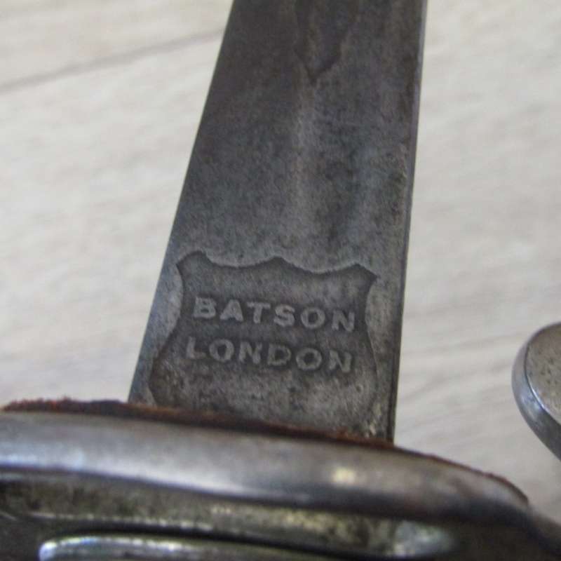 Royal Artillery sword in leather sleeve who belonged to TEJ St Vaughan