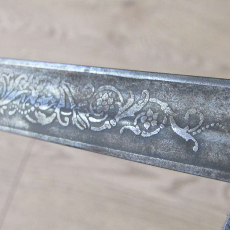 Royal Artillery sword in leather sleeve who belonged to TEJ St Vaughan