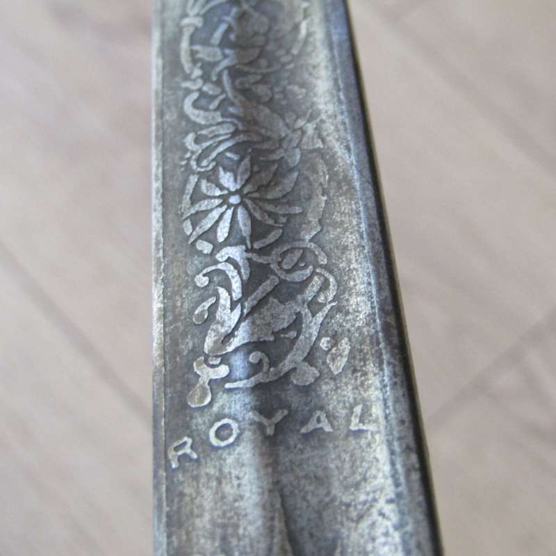 Royal Artillery sword in leather sleeve who belonged to TEJ St Vaughan