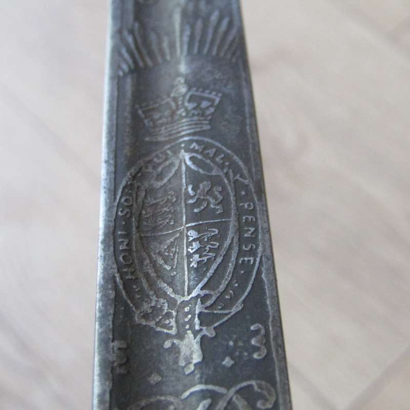 Royal Artillery sword in leather sleeve who belonged to TEJ St Vaughan