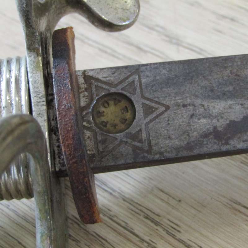 Royal Artillery sword in leather sleeve who belonged to TEJ St Vaughan