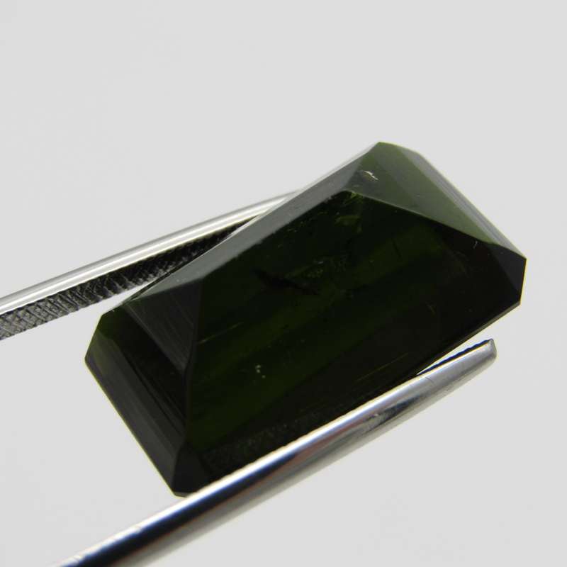 Dark toned green Tourmaline Emerald cut - large 16,8 carat stone with Gemlab certificate