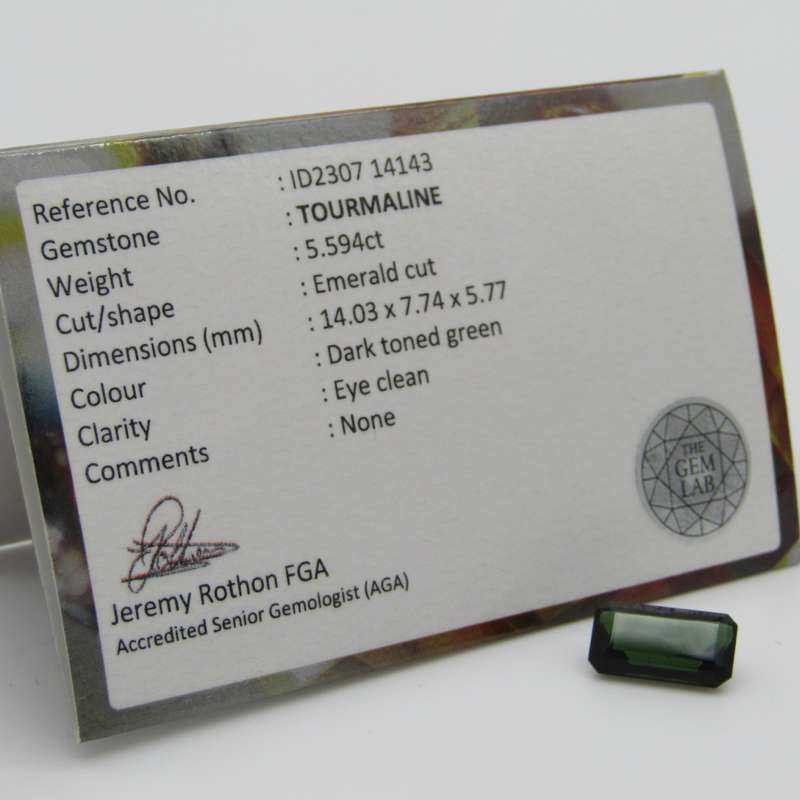 Dark toned Green Tourmaline of 5,59 carat Emerald cut with Gemlab certificate