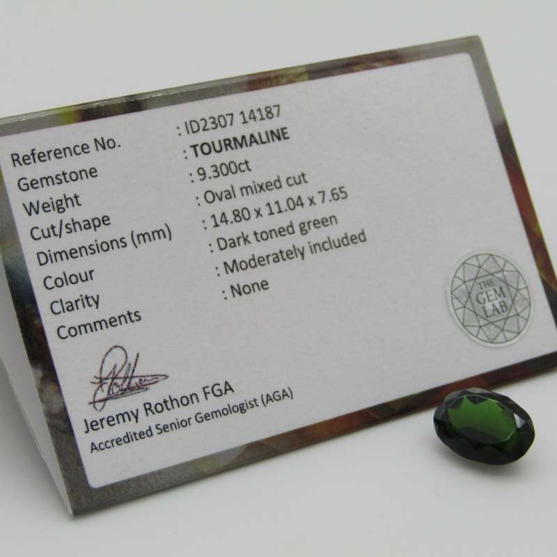 Tourmaline of 9,3 carat - oval mixed cut - dark toned green with Gemlab certificate