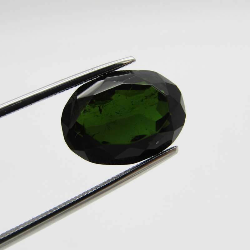 Tourmaline of 9,3 carat - oval mixed cut - dark toned green with Gemlab certificate
