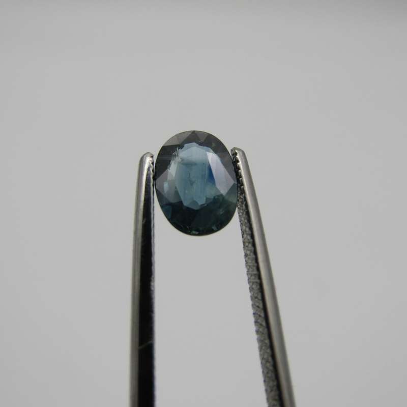 Natural Sapphire of 0,97 carat - oval mixed cut - medium dark toned blue with Gemlab certificate