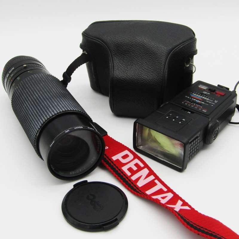 Vintage Pentax K1000 camera with extra lens and flash - very good condition