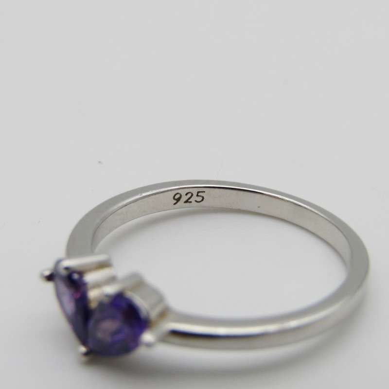 Sterling Silver ring with two teardrop shaped purple stones - Size P - Weighs 2g