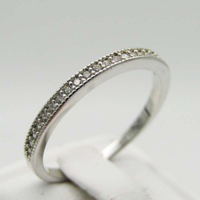Sterling Silver ring with small clear stones - Size Q