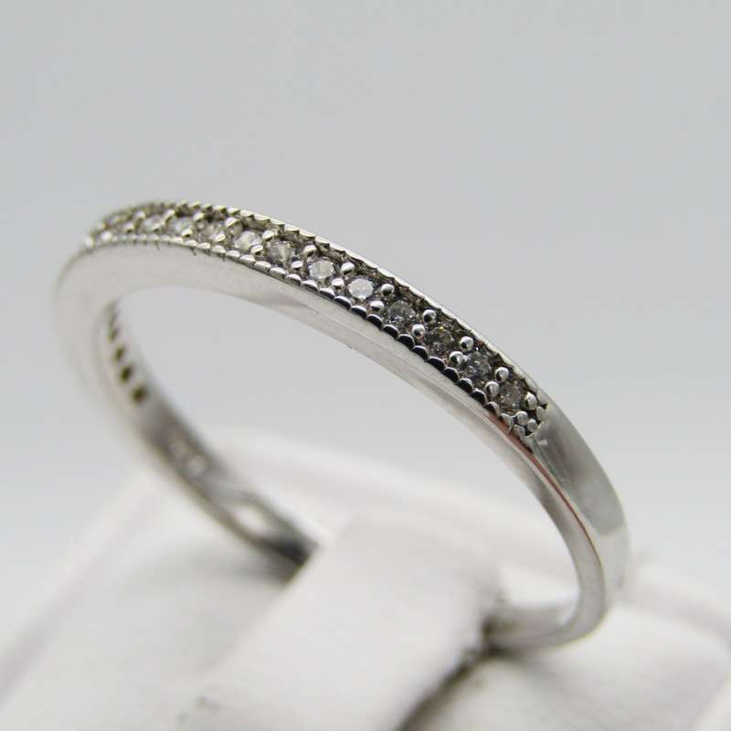 Sterling Silver ring with small clear stones - Size Q