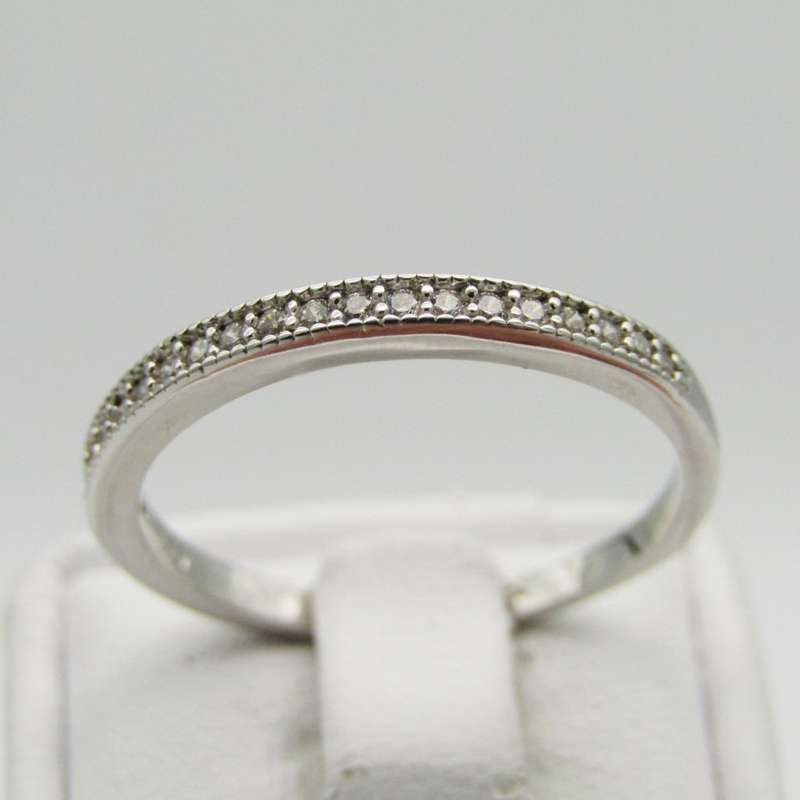 Sterling Silver ring with small clear stones - Size Q