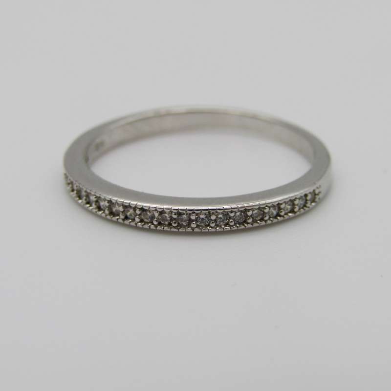 Sterling Silver ring with small clear stones - Size Q