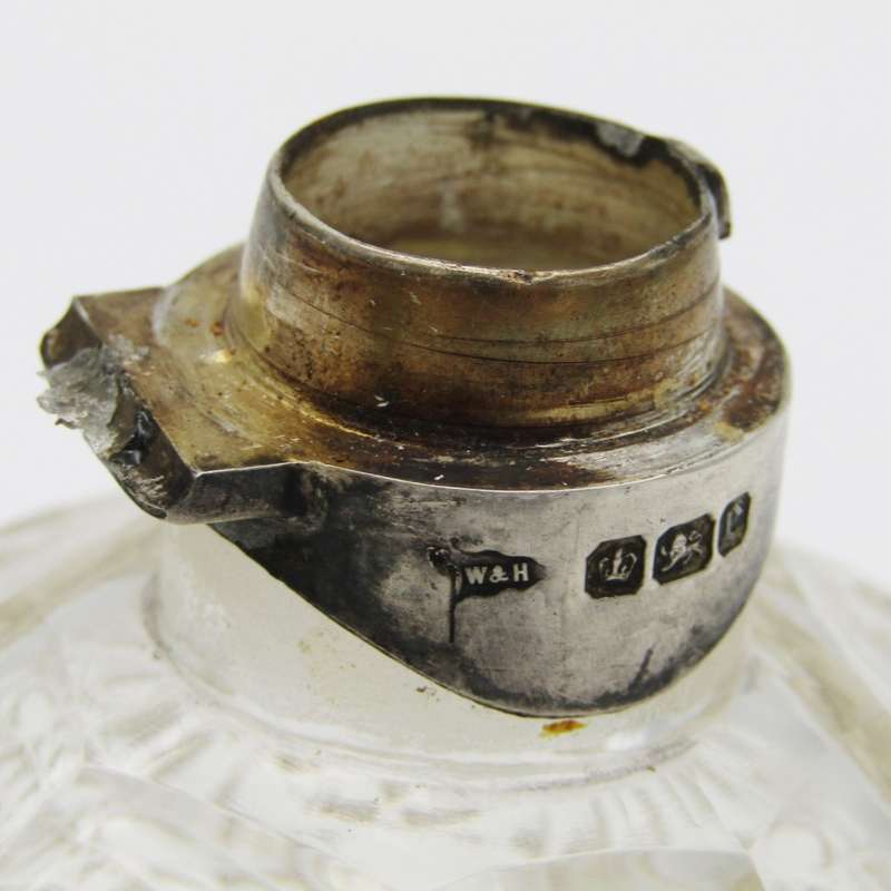 Beautiful glass dressing table bottle with Sterling silver top - lid hinge broken - neck chipped
