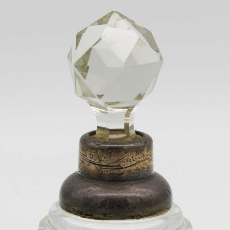 Antique dressing table mini crystal decanter with hallmarked sterling silver rim