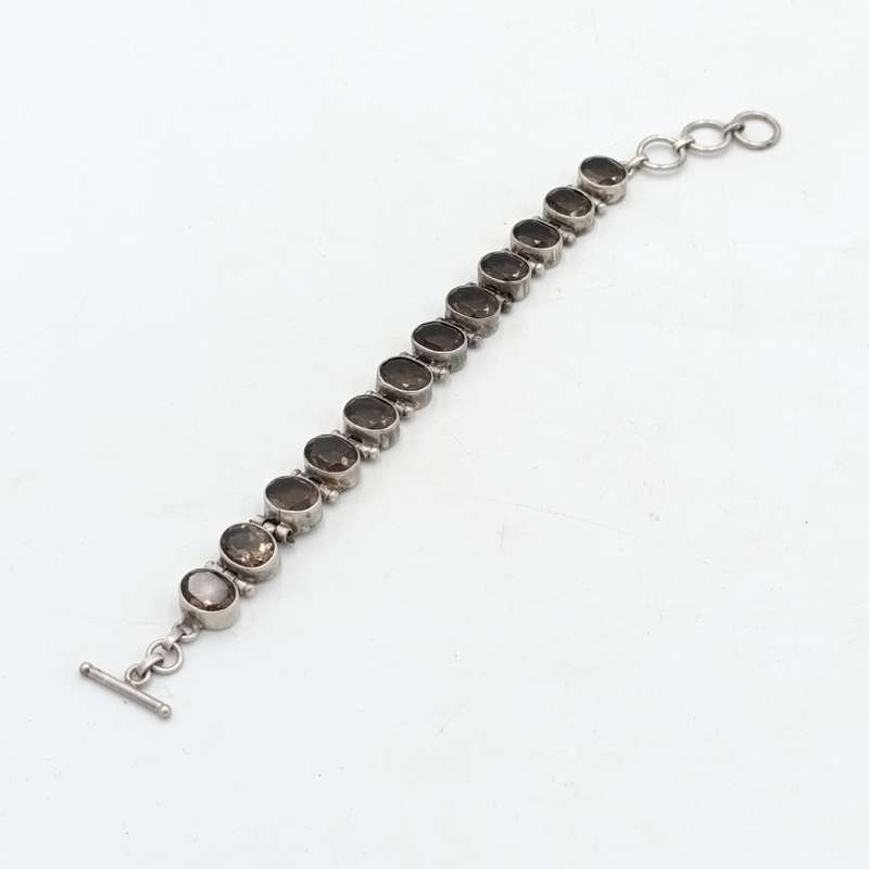 Sterling Silver Agenta bracelet with 12 smokey quarts stones of about 3 carat each - size 19cm long