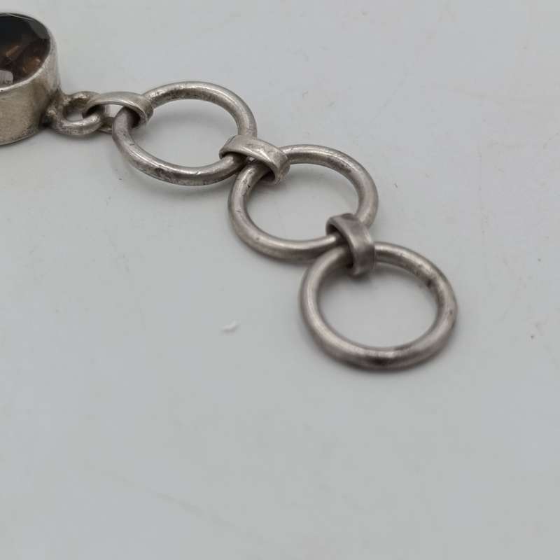 Sterling Silver Agenta bracelet with 12 smokey quarts stones of about 3 carat each - size 19cm long