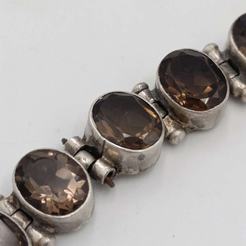 Sterling Silver Agenta bracelet with 12 smokey quarts stones of about 3 carat each - size 19cm long