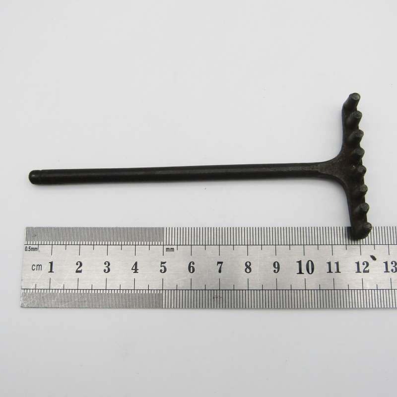 Antique miniature cast iron rake and garden hoe