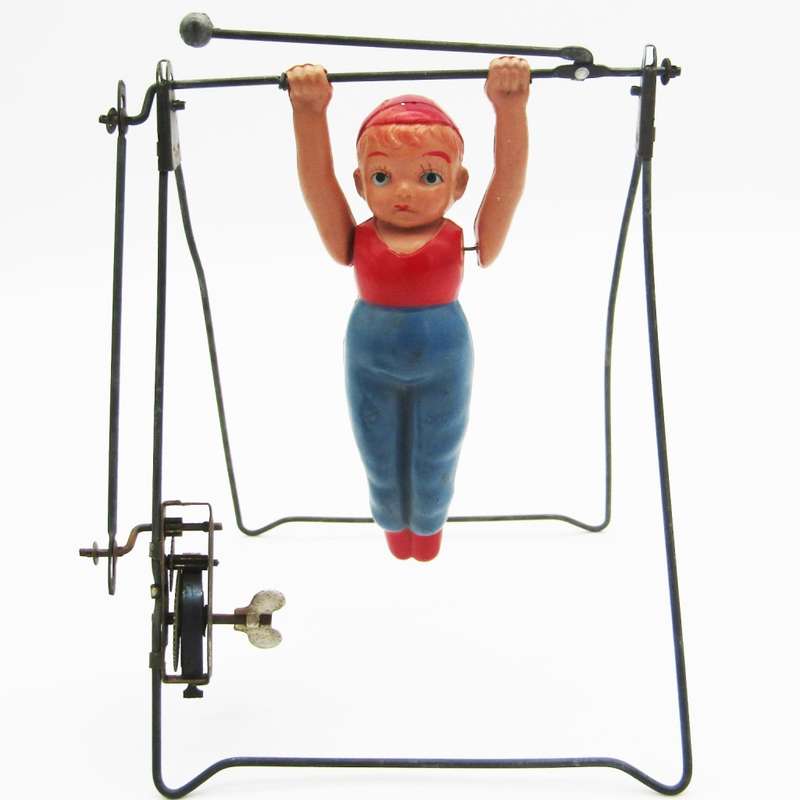 Vintage mechanical gymnast toy - main spring broken