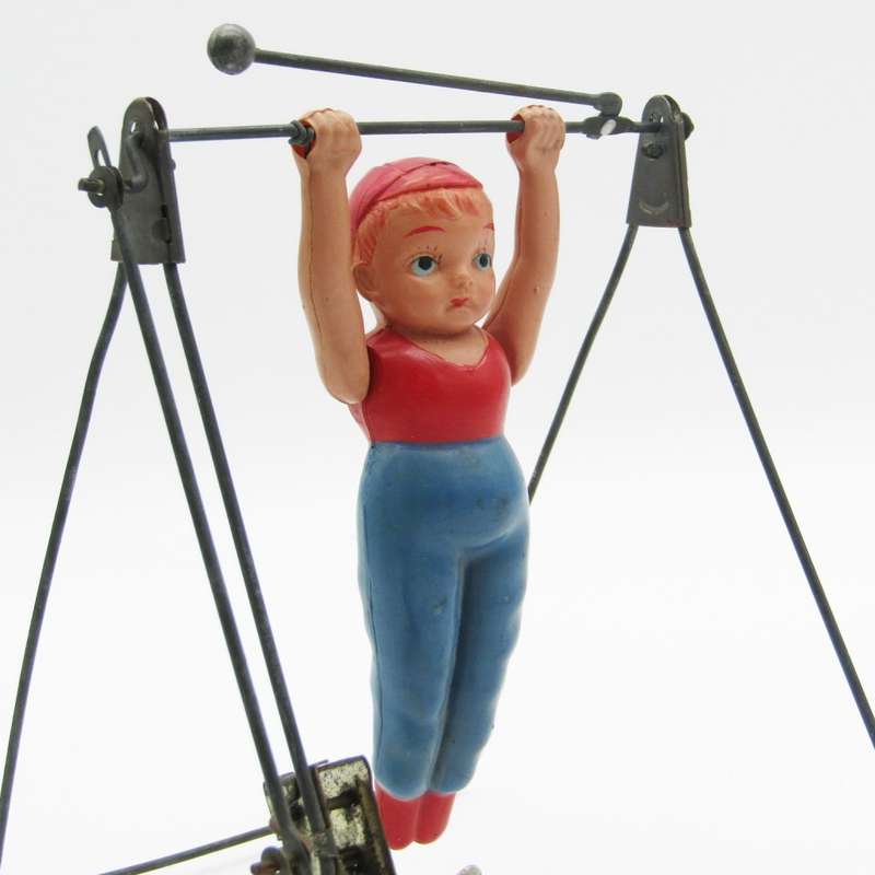 Vintage mechanical gymnast toy - main spring broken