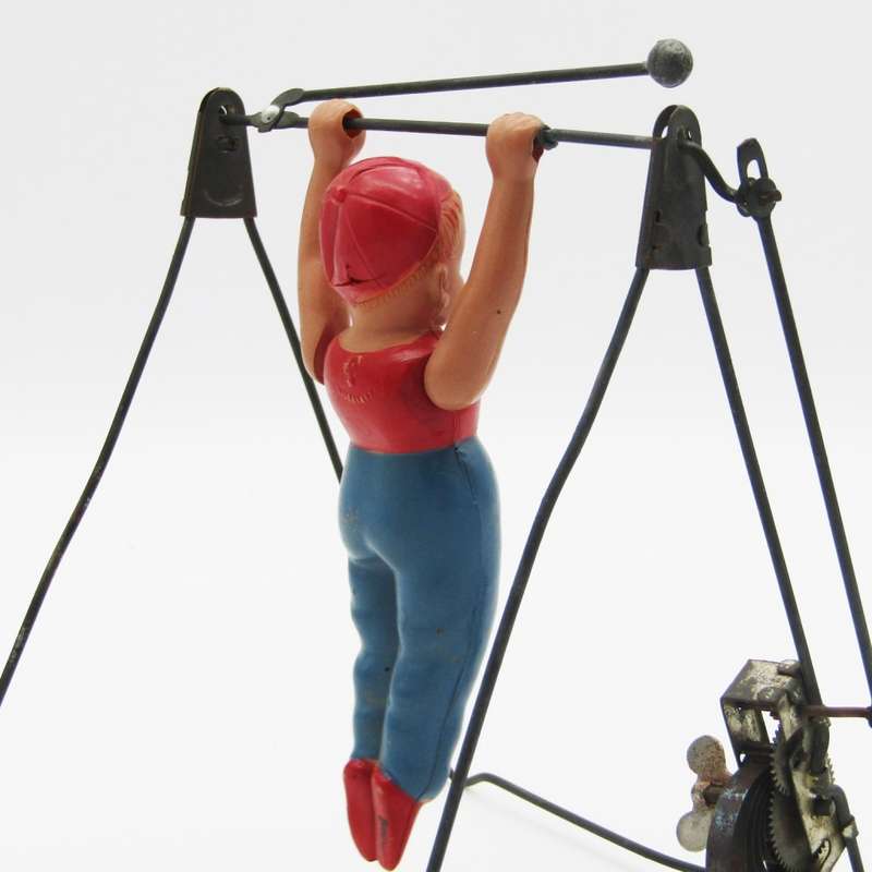 Vintage mechanical gymnast toy - main spring broken
