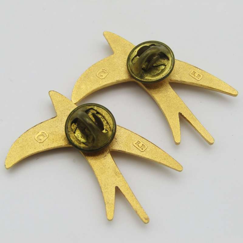 Pair of South African Postal Speed Services pin badges