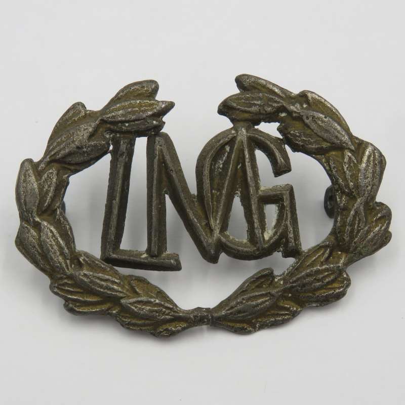 Light Machine gunner lead cast badge- wreath broken in centre