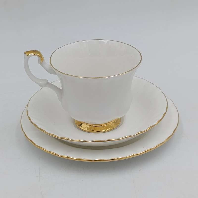 Royal Albert Val d`or porcelain tea set - 6 trios, milk jug and bowl