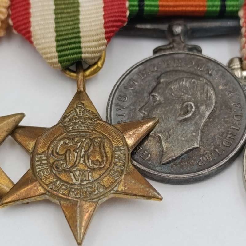 WW2 Air Force Cross miniature medal set with dogtag and SAAF token - dogtag named WO.II D. Slabbert