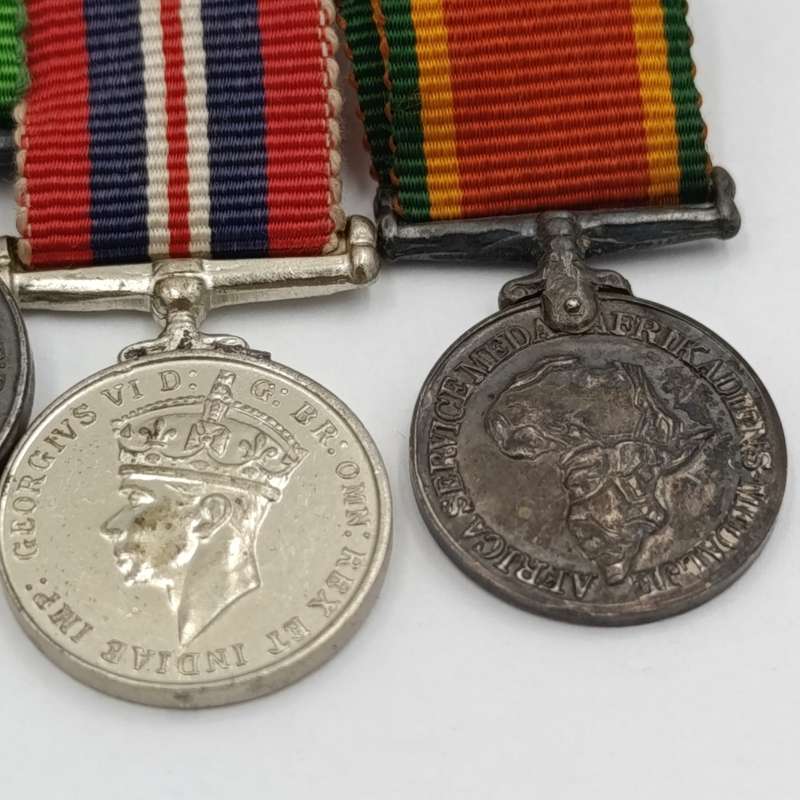 WW2 Air Force Cross miniature medal set with dogtag and SAAF token - dogtag named WO.II D. Slabbert