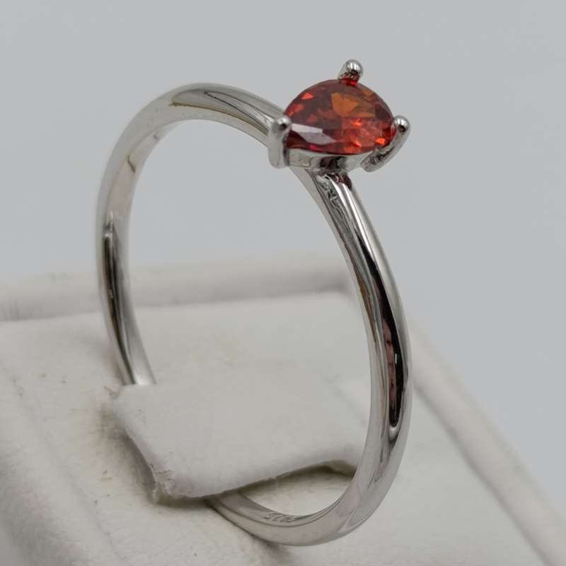 Sterling silver ring with dark orange teardrop shaped stone - size U - 1.5g