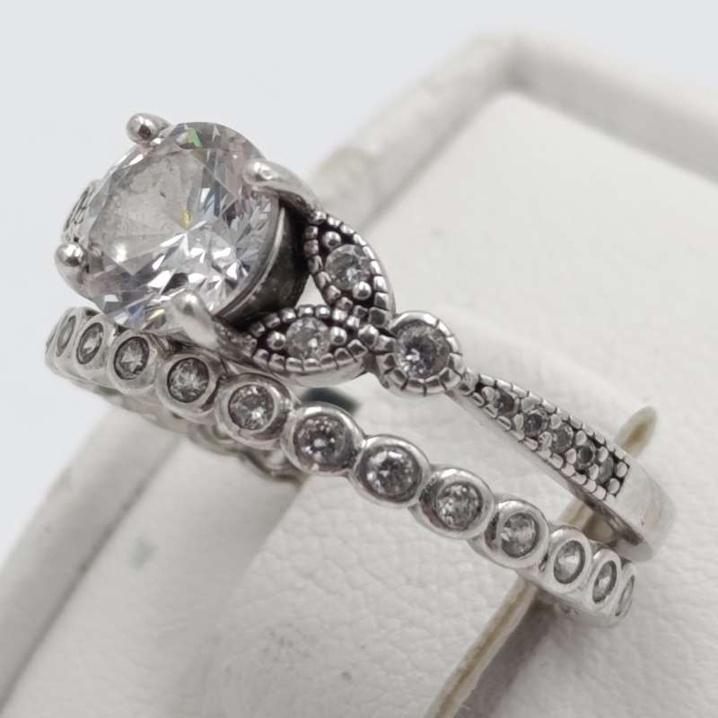 Beautiful silver wedding band set - infinity band and ring with large clear stone - size O - 4.2g