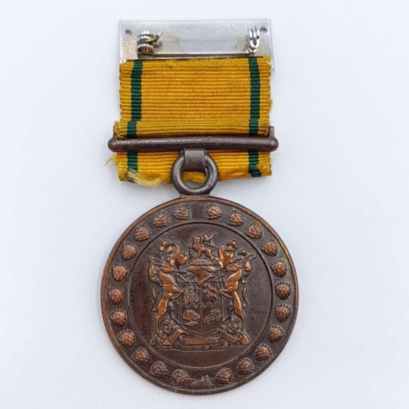 SA Prison service faithful service medal issued to K7057-J Bew. J.Manus #1062