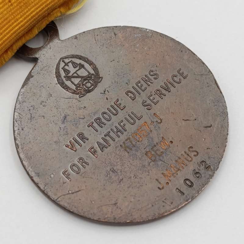 SA Prison service faithful service medal issued to K7057-J Bew. J.Manus #1062