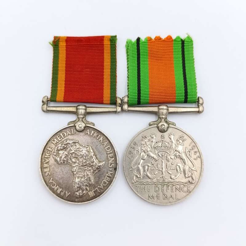 Pair of WW2 medals issued to C169528 T Paulsen - Africa service medal and WW2 Defence medal