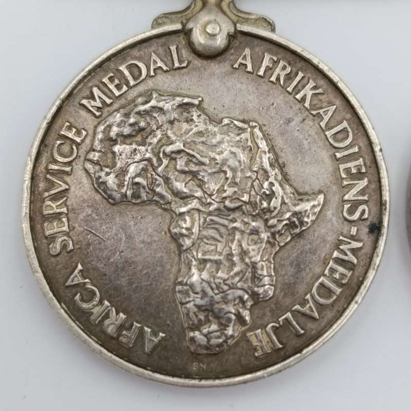 Pair of WW2 medals issued to C169528 T Paulsen - Africa service medal and WW2 Defence medal
