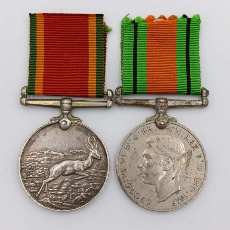 Pair of WW2 medals issued to C169528 T Paulsen - Africa service medal and WW2 Defence medal