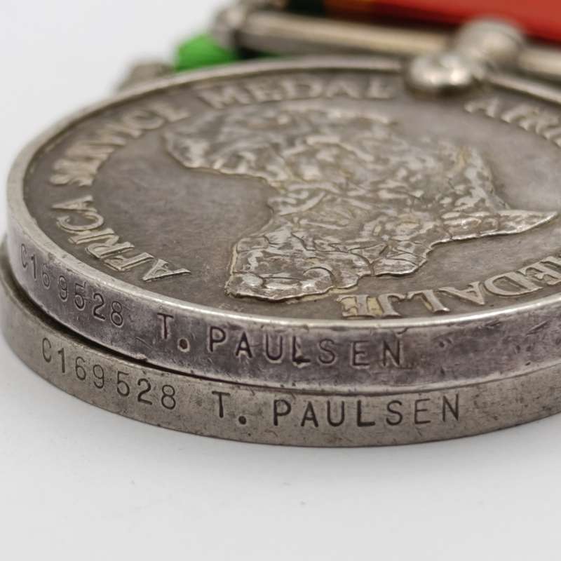 Pair of WW2 medals issued to C169528 T Paulsen - Africa service medal and WW2 Defence medal