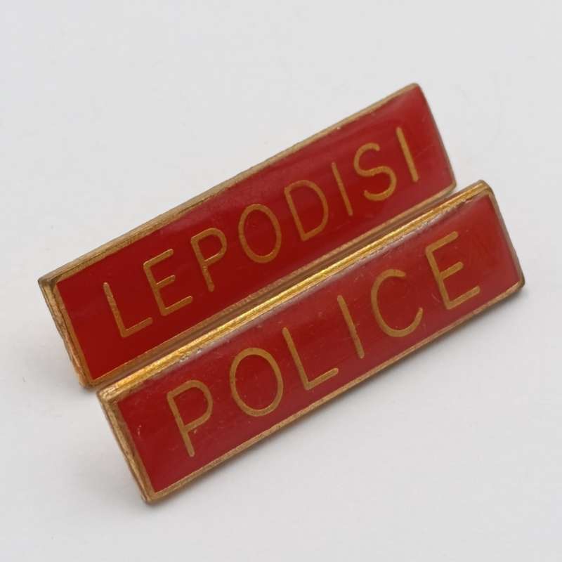 Pair of Bophuthutswana Police breast badges (one Tshana and one English)