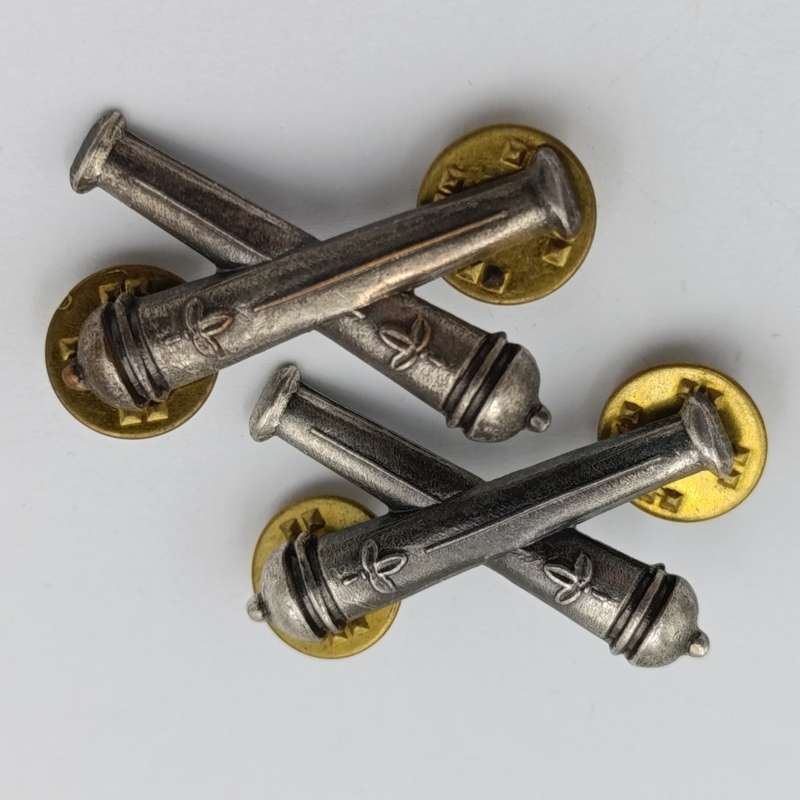 Pair of SWATF Artillery collar badges