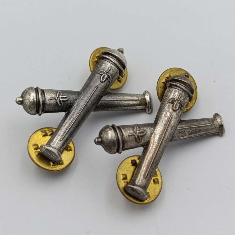 Pair of SWATF Artillery collar badges