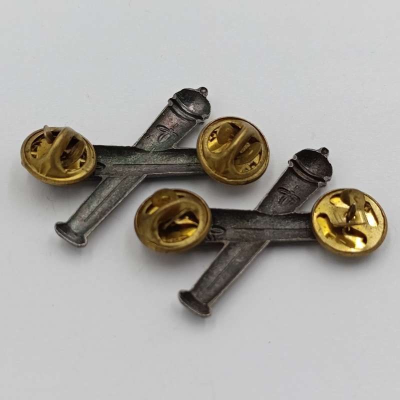 Pair of SWATF Artillery collar badges