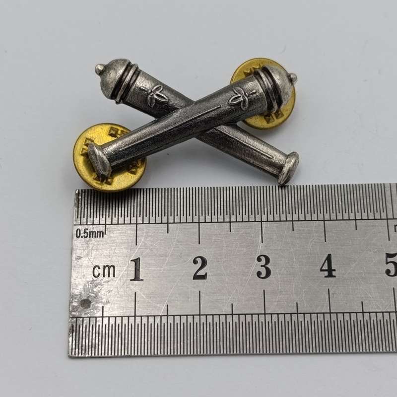 Pair of SWATF Artillery collar badges