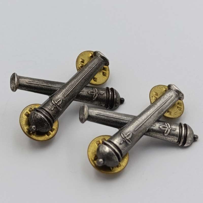 Pair of SWATF Artillery collar badges