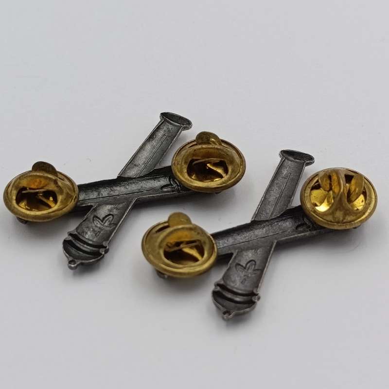 Pair of SWATF Artillery collar badges