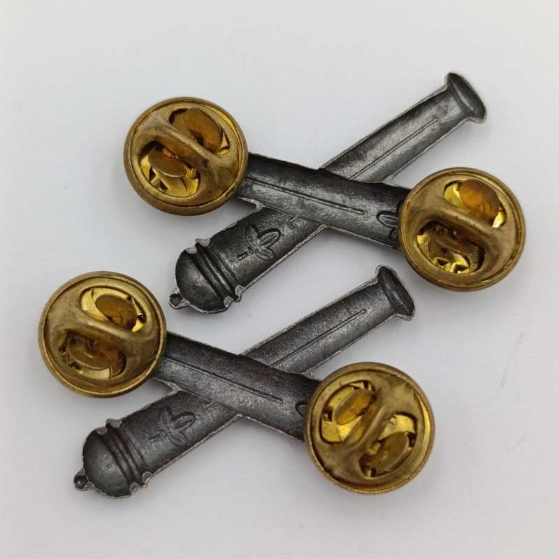 Pair of SWATF Artillery collar badges