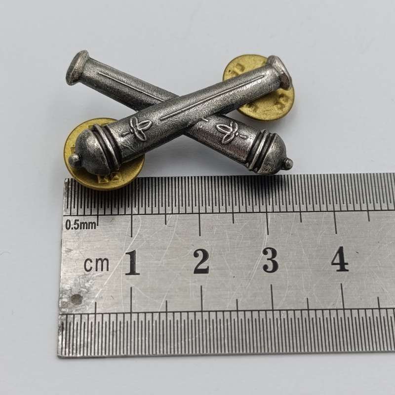Pair of SWATF Artillery collar badges