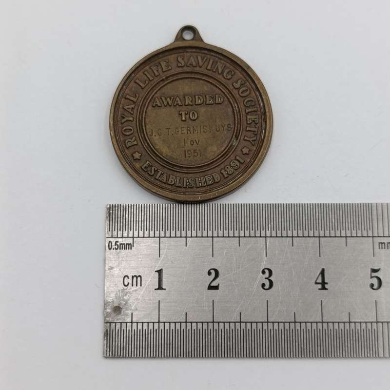 Royal Life saving society medal and badge of J.G.T Germishuys