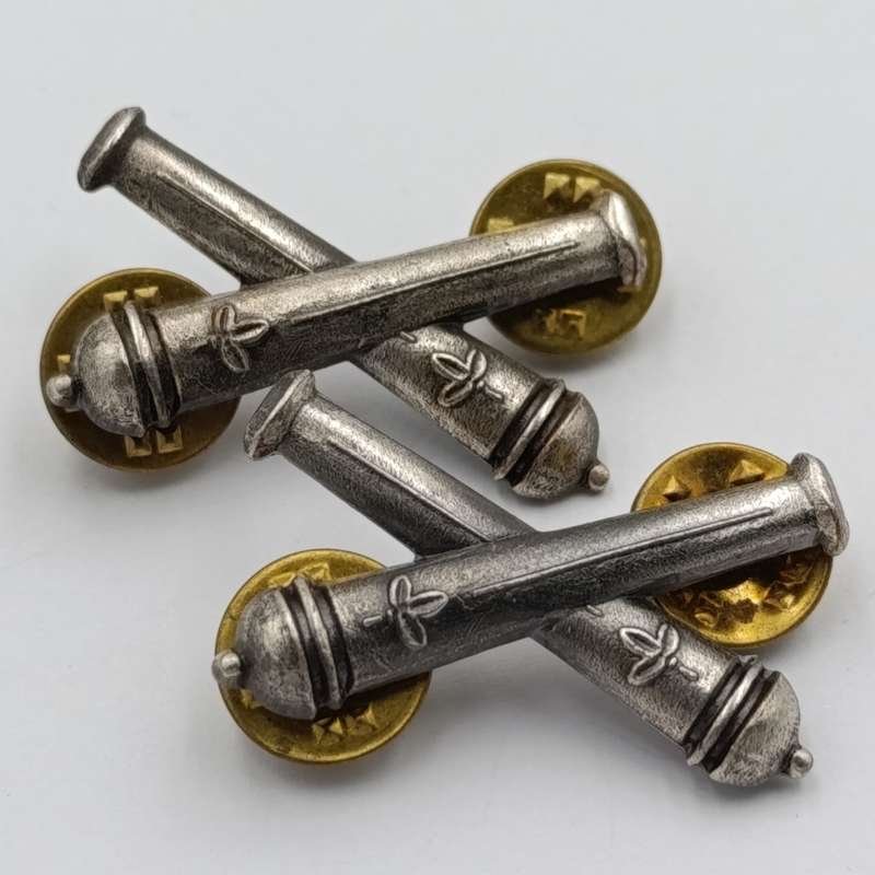 Pair of SWATF Artillery collar badges