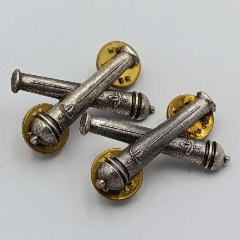 Pair of SWATF Artillery collar badges